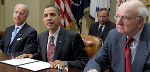 President Barack Obama, flanked by Vice President Joe Biden, Bailout Director Larry Summers (rear), and White House adviser Paul Volcker, speaks during a meeting of the President's Economic Recovery Advisory Board in 2010. Photo Source: Center for American Progress.