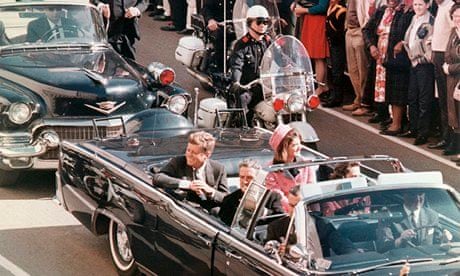 President John F. Kennedy and his wife, Jackie, in the Dallas TX motorcade moments before he was shot on Nov. 22, 1963. Photograph: Bettmann/Corbis