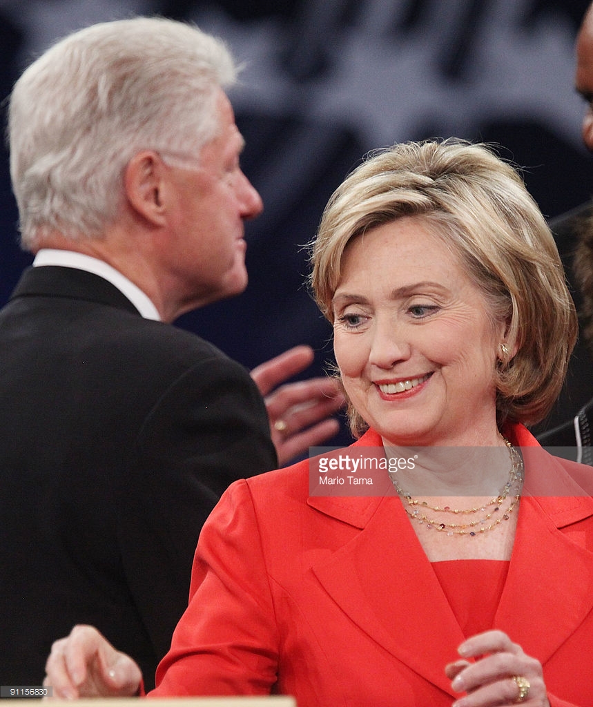 Former President Bill Clinton (L) and U.S. Secretary of State Hillary Rodham Clinton look on after Hillary spoke at the Clinton Global Initiative (CGI) September 25, 2009 in New York City. The fifth annual meeting of the CGI gathers prominent individuals in politics, business, science, academics, religion and entertainment to discuss global issues such as climate change and peace in the Middle East. The event, founded by Clinton after he left office, is held the same week as the General Assembly at the United Nations, when most world leaders are in New York City. Getty Images.